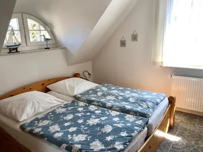 Ein Bett oder Betten in einem Zimmer der Unterkunft 