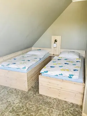Ein Bett oder Betten in einem Zimmer der Unterkunft 