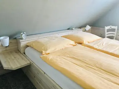 Ein Bett oder Betten in einem Zimmer der Unterkunft 