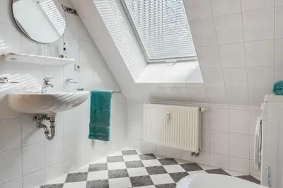 Ein Badezimmer in der Unterkunft Friedenstraße 21 Whg 5
