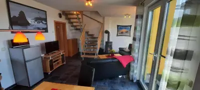 Ein Sitzbereich in der Unterkunft Ferienhaus-Bodden