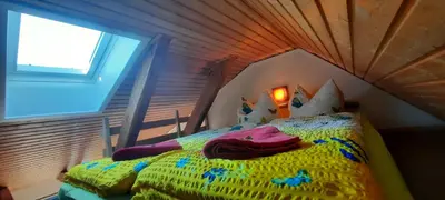 Ein Bett oder Betten in einem Zimmer der Unterkunft Ferienhaus-Bodden