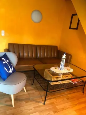 Ein Sitzbereich in der Unterkunft Maisonettewohnung auf 2 Etagen mit zwei Balkonen