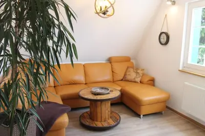 Ein Sitzbereich in der Unterkunft Boddenkahn