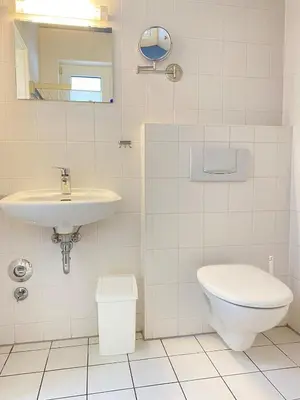Ein Badezimmer in der Unterkunft Haus Claudia