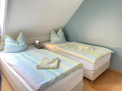 Ein Bett oder Betten in einem Zimmer der Unterkunft Haus Claudia