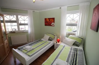 Ein Bett oder Betten in einem Zimmer der Unterkunft Fewo Anna