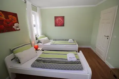 Ein Bett oder Betten in einem Zimmer der Unterkunft Fewo Anna