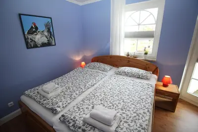 Ein Bett oder Betten in einem Zimmer der Unterkunft Fewo Anna