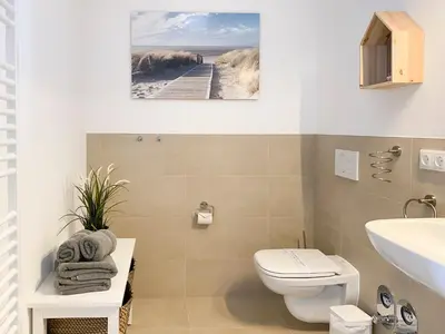 Ein Badezimmer in der Unterkunft Sterntaucher 02