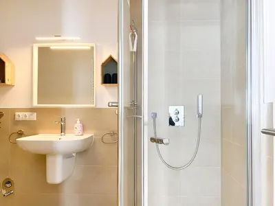 Ein Badezimmer in der Unterkunft Sterntaucher 02