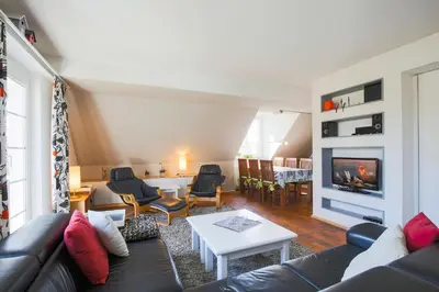Ein Sitzbereich in der Unterkunft bi uns to Hus
