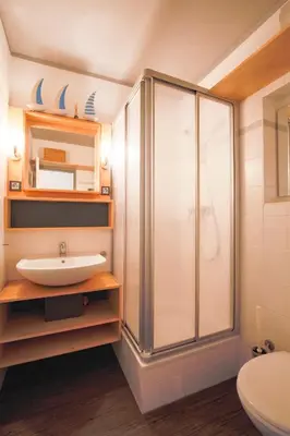 Ein Badezimmer in der Unterkunft bi uns to Hus