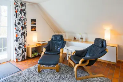 Ein Sitzbereich in der Unterkunft bi uns to Hus