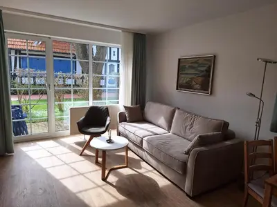 Ein Sitzbereich in der Unterkunft Ferienwohnung Mühlenstr Prerow, ruhig, zentral, mit Terrasse