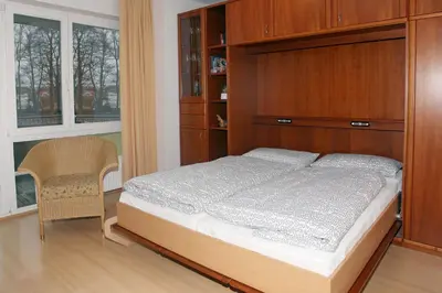 Ein Bett oder Betten in einem Zimmer der Unterkunft Likedeeler Weg 1 Whg 21