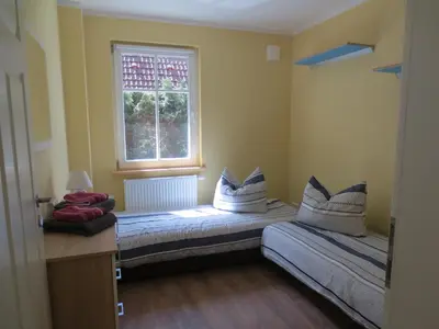 Ein Bett oder Betten in einem Zimmer der Unterkunft Sigi sin Hus 26a