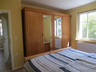Ein Bett oder Betten in einem Zimmer der Unterkunft Sigi sin Hus 26a