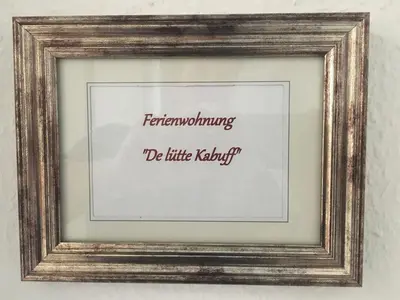 Ein Zertifikat, Auszeichnung, Logo oder anderes Dokument, das in der Unterkunft de lütte Kabuff ausgestellt ist
