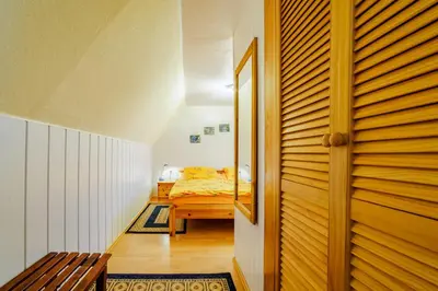 Ein Bett oder Betten in einem Zimmer der Unterkunft Ferienwohnungen im Deichweg