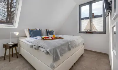 Ein Bett oder Betten in einem Zimmer der Unterkunft Haus Liesing