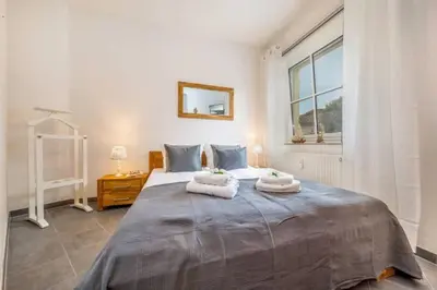 Ein Bett oder Betten in einem Zimmer der Unterkunft Kutterkoje