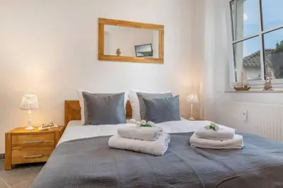 Ein Bett oder Betten in einem Zimmer der Unterkunft Kutterkoje