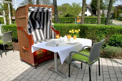 Ein Garten an der Unterkunft Hotel Haus Kranich