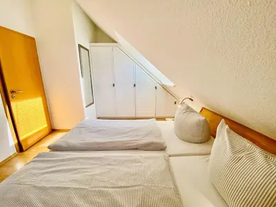 Ein Bett oder Betten in einem Zimmer der Unterkunft Sunshine