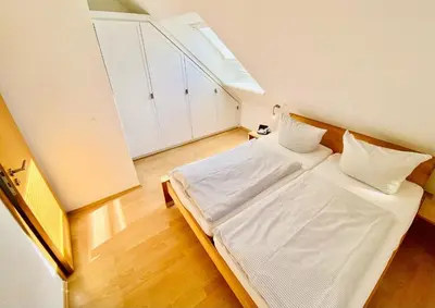 Ein Bett oder Betten in einem Zimmer der Unterkunft Sunshine