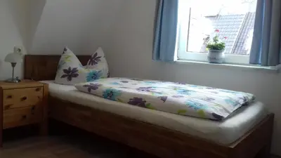 Ein Bett oder Betten in einem Zimmer der Unterkunft Meyers Ausguck