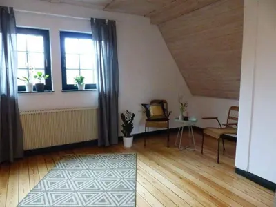 Ein Sitzbereich in der Unterkunft Darßer Strandgut - Haus Butzek