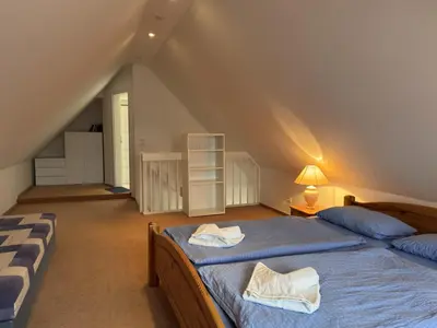 Ein Bett oder Betten in einem Zimmer der Unterkunft Villa in Zingst nahe Ostseestrand