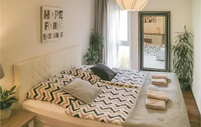 Ein Bett oder Betten in einem Zimmer der Unterkunft 2 Bedroom Beautiful Apartment In Barth