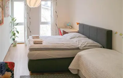 Ein Bett oder Betten in einem Zimmer der Unterkunft 2 Bedroom Beautiful Apartment In Barth