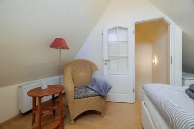 Ein Bett oder Betten in einem Zimmer der Unterkunft Haus Möwe
