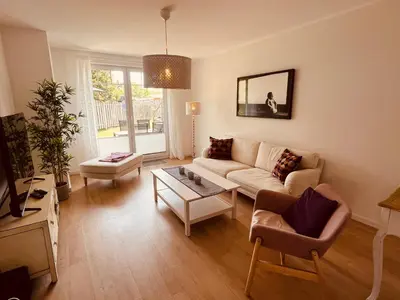 Ein Sitzbereich in der Unterkunft Ferienwohnung Art in Born