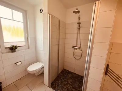 Ein Badezimmer in der Unterkunft Ferienwohnung Art in Born