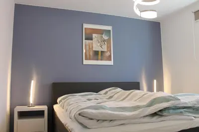 Ein Bett oder Betten in einem Zimmer der Unterkunft Ferienwohnung de Windroos