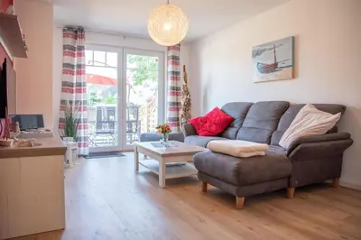 Ein Sitzbereich in der Unterkunft Ferienwohnung @Home in Born