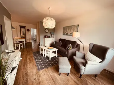 Ein Sitzbereich in der Unterkunft Ferienwohnung van der Holm