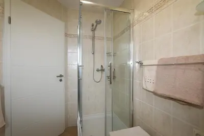 Ein Badezimmer in der Unterkunft Ferienwohnung Strandaster
