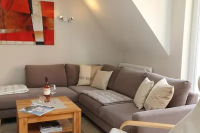 Ein Sitzbereich in der Unterkunft Ferienwohnung Strandaster