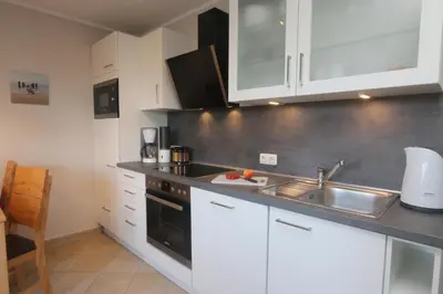 Küche/Küchenzeile in der Unterkunft Ferienwohnung Strandaster