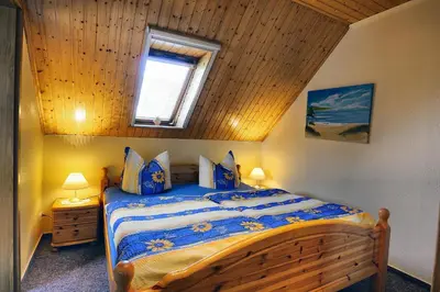 Ein Bett oder Betten in einem Zimmer der Unterkunft Schäfer, Renate FW 2