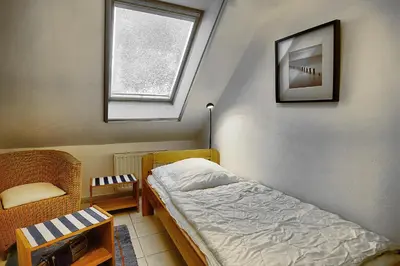 Ein Bett oder Betten in einem Zimmer der Unterkunft Am Strand 4,PP innen