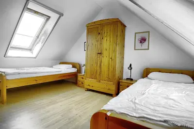 Ein Bett oder Betten in einem Zimmer der Unterkunft Am Strand 4,PP innen