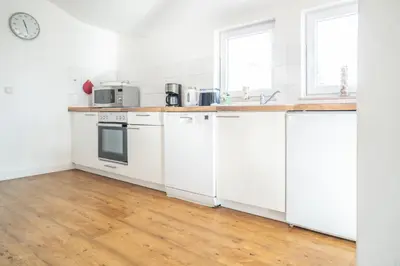 Küche/Küchenzeile in der Unterkunft Haus Alte Bäckerei - Boddenblick