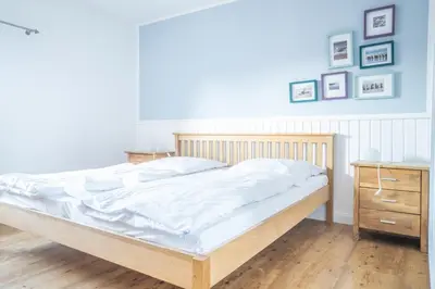 Ein Bett oder Betten in einem Zimmer der Unterkunft Haus Alte Bäckerei - Boddenblick
