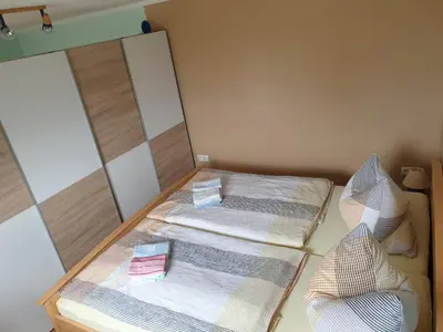 Ein Bett oder Betten in einem Zimmer der Unterkunft Ferienhaus Scheffler